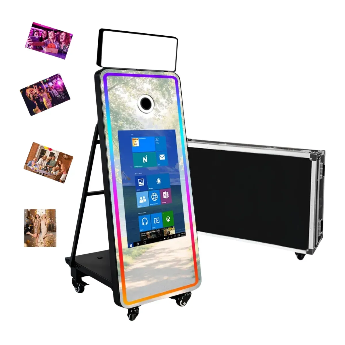 A mirror photo booth on a wheeled base with a folding rear leg, a colour-shifting light running right around the glass, a small camera opening near the top and a Windows desktop showing through the mirror surface, with a black flight case standing behind it and four sample photo prints floating alongside