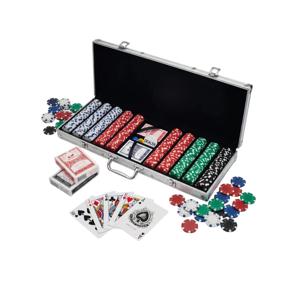 An open aluminium case lined in black velour, filled with stacked rows of casino chips in red, white, green and black, two sealed card decks and a dealer button set into the tray, with loose chips and a fanned poker hand laid out in front of it