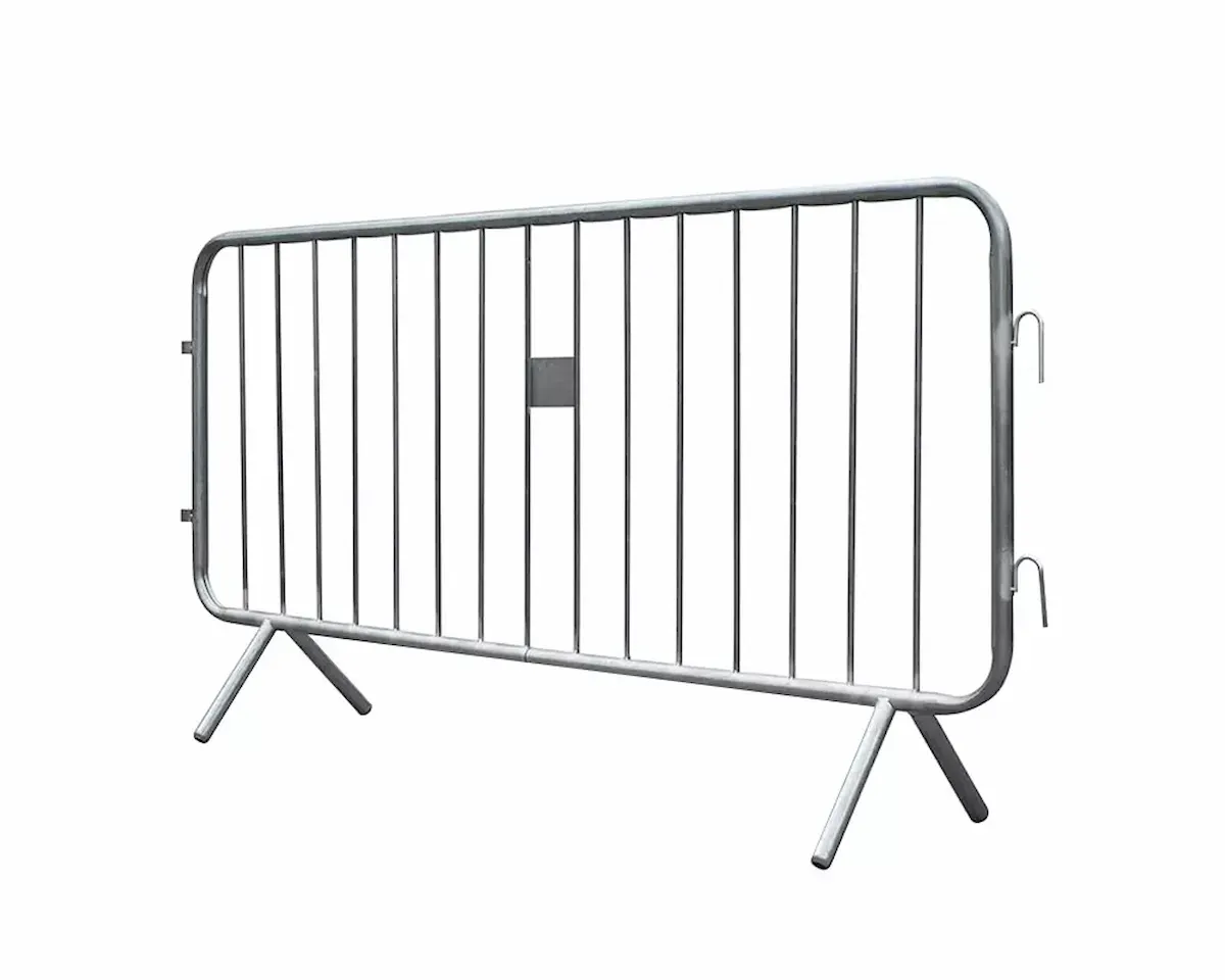 A single galvanised bike rack barricade section standing square on its bridge feet